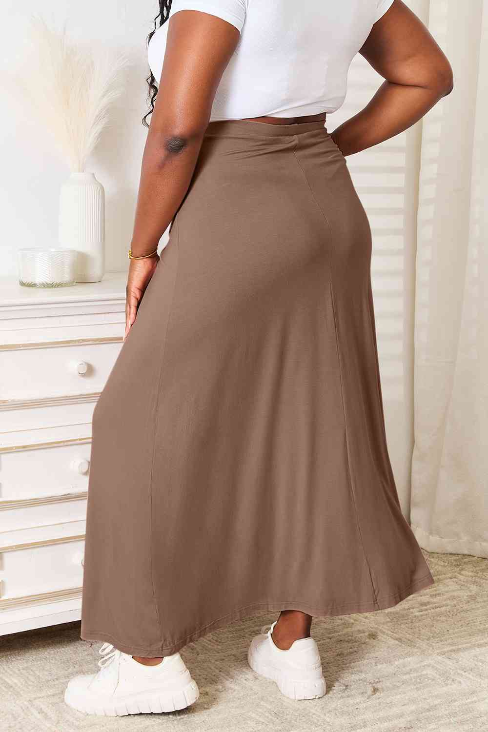 A stylish Double Take Full Size Soft Rayon Drawstring Waist Maxi Skirt in a flowing design, showcasing its adjustable drawstring waist and soft fabric.