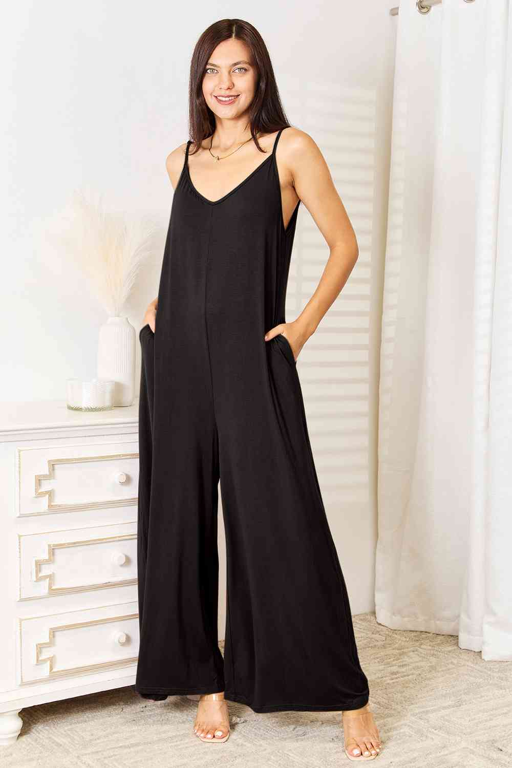 Double Take Full Size Soft Rayon Spaghetti Strap Tied Wide Leg jumpsuit in a stylish design, featuring spaghetti straps and a tied waist detail.