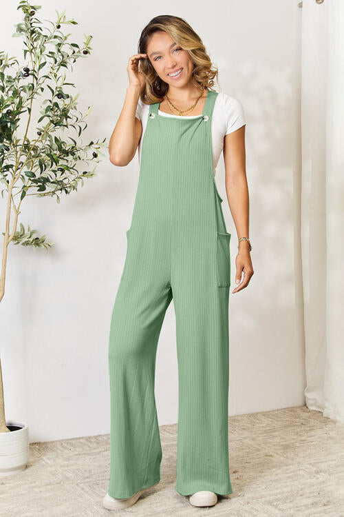 Double Take Full Size Wide Strap Overall with Pockets in a stylish design, showcasing its wide straps and multiple pockets.