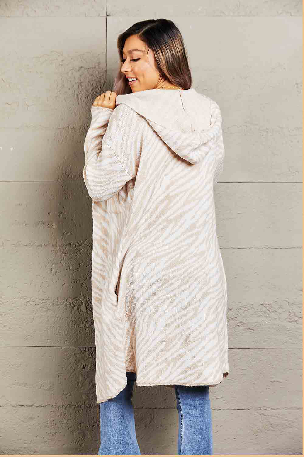 Double Take Printed Open Front Hooded Longline Cardigan featuring animal print design, long sleeves, and open front style.