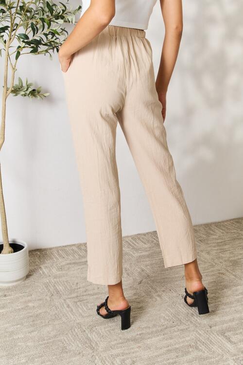 Double Take Pull-On Pants with Pockets in a stylish straight-leg design, showcasing their comfortable fabric and practical pockets.