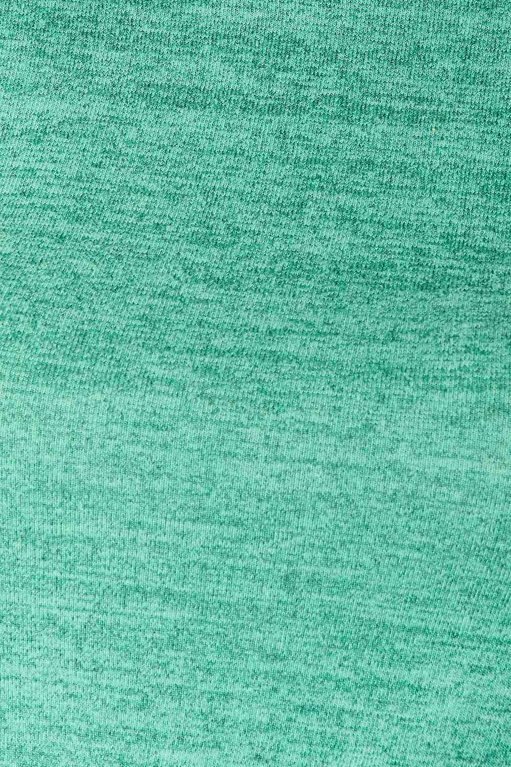 Double Take Ruffle Shoulder Long Sleeve T-Shirt featuring elegant ruffle detailing on shoulders, available in various sizes.