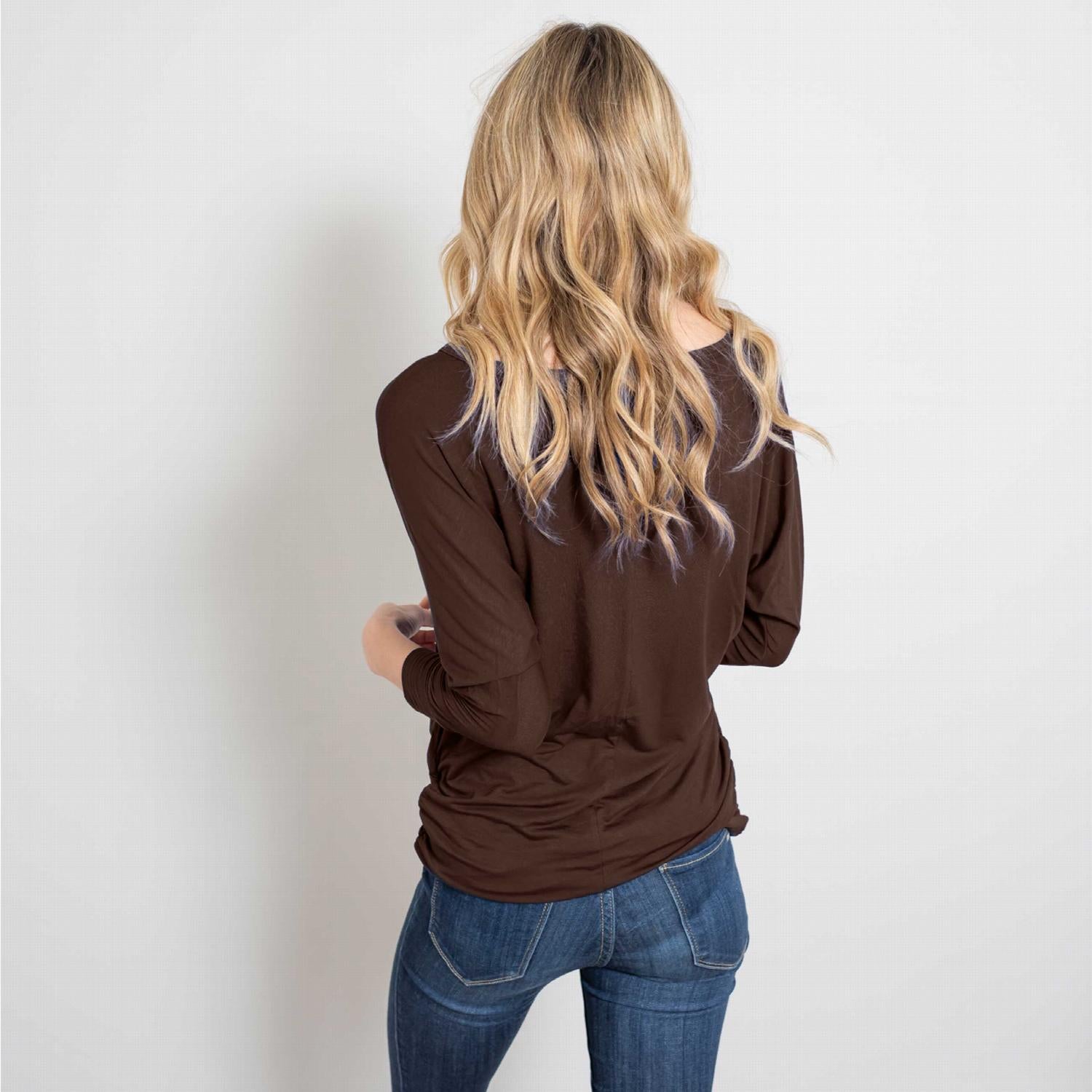 Draped Long Sleeve Batwing Dolman Top in various colors, showcasing its stylish batwing design and fitted arms.