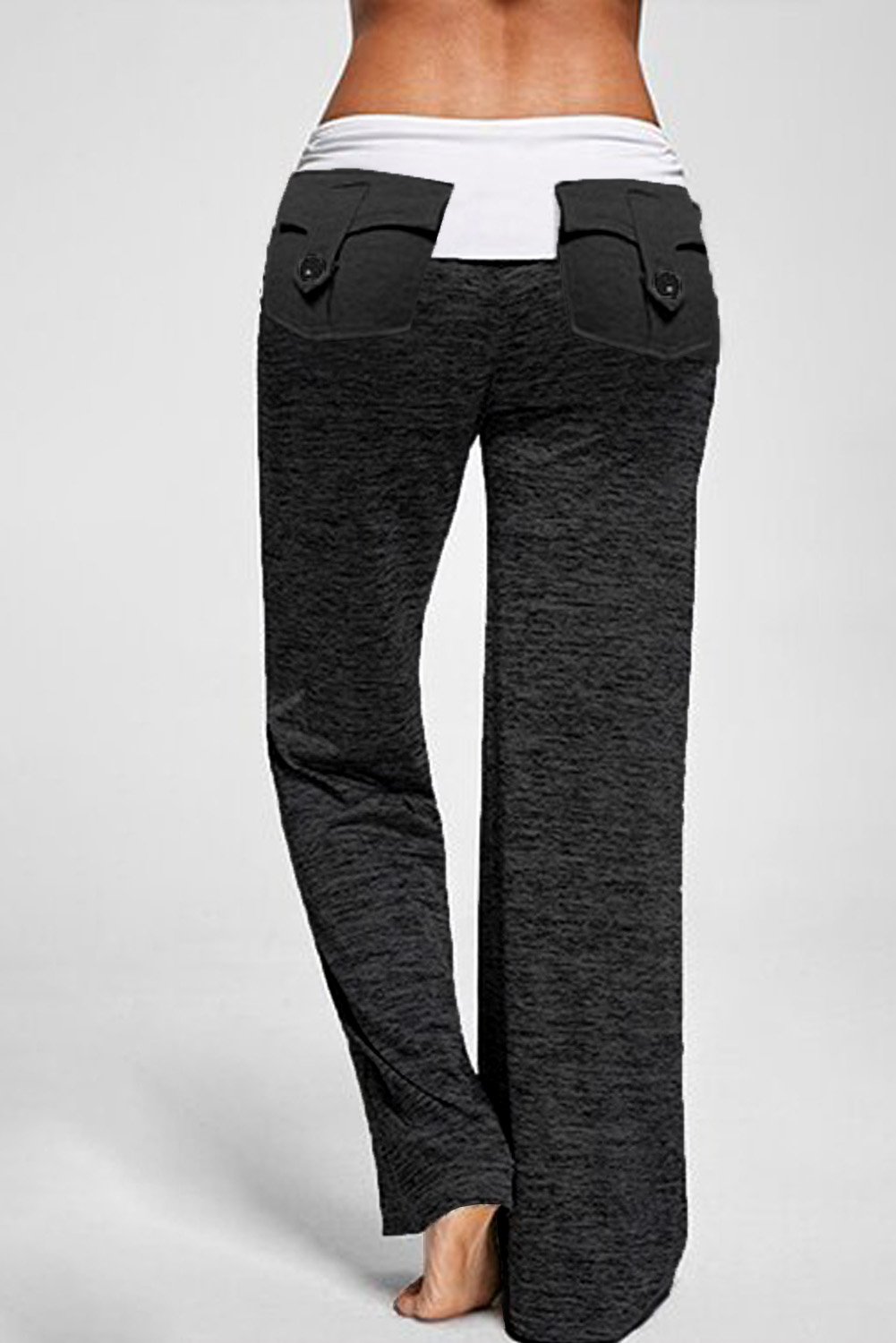 A pair of stylish drawstring pockets stretch wide leg yoga pants featuring a mid-rise waistband, leopard print accents, and multiple pockets.