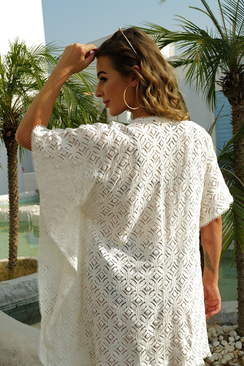 A stylish Drawstring Waist Mini Dress featuring a plunge neckline and flutter half sleeves, perfect for casual outings.