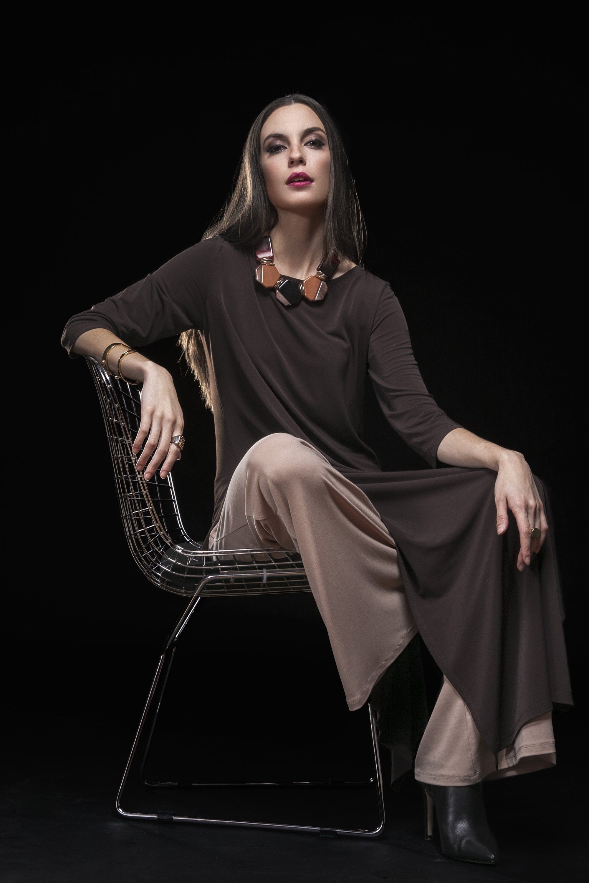 A stylish Dress Over Pant featuring high slits, made from soft stretch knit jersey, perfect for versatile styling over various bottoms.