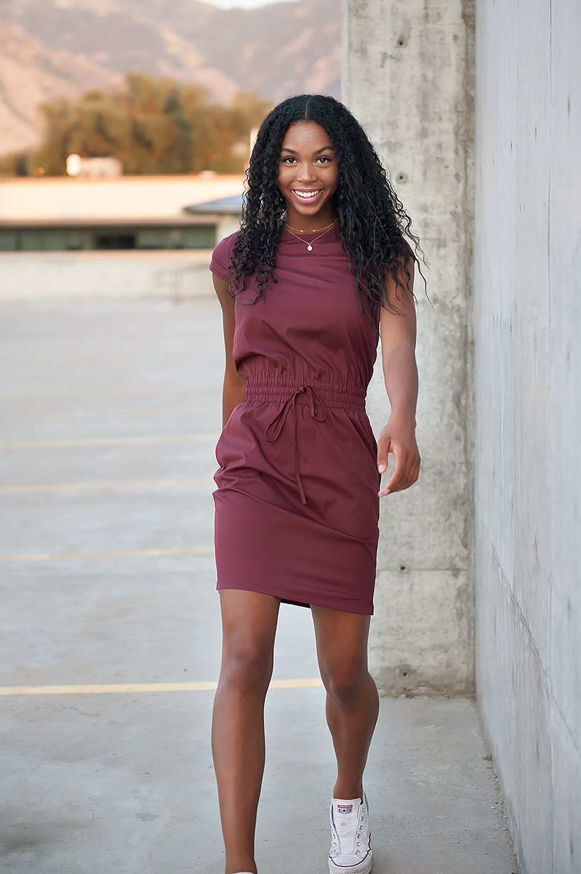 DT Women's DOWNTOWN Lightweight Dress in Burgundy with cap sleeves and pockets, showcasing its elegant design and adjustable waistband.