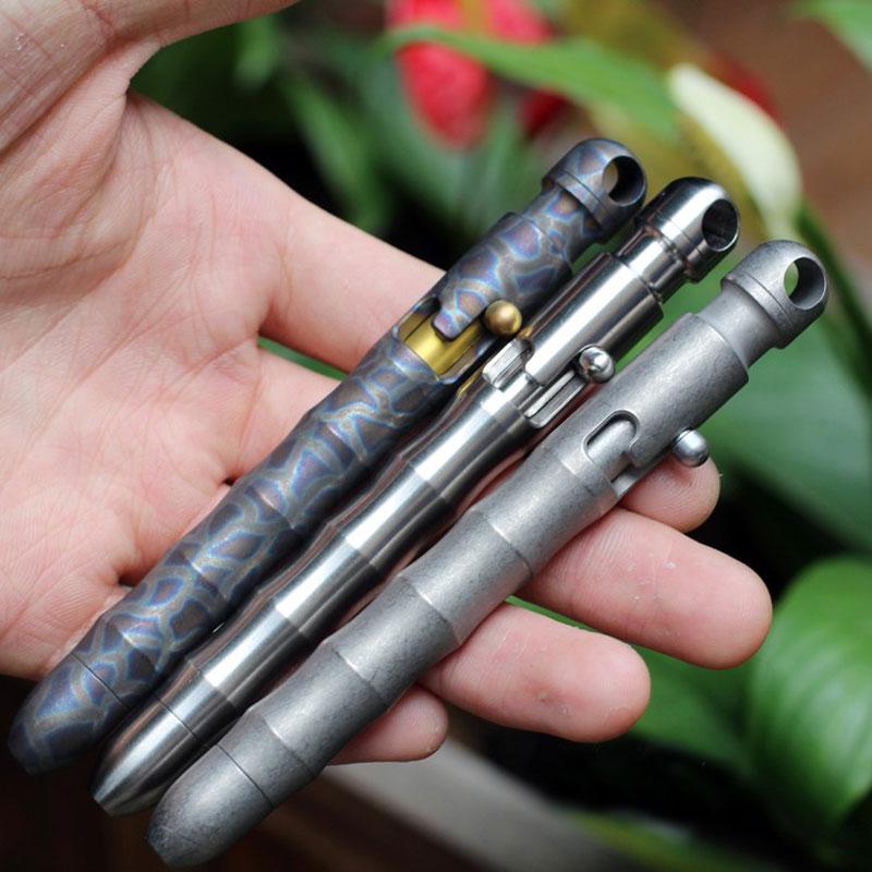 EDC Outdoor Titanium TC4 Krait Tactical Pen in three finishes: Natural, Stone Wash, and Flame, showcasing its sleek design and compact size.