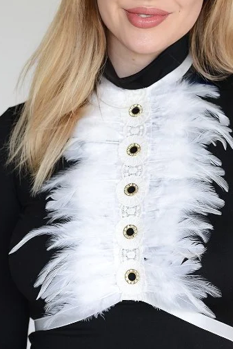 White elastic strap bra with decorative feathers on the front, showcasing adjustable straps and back closure.