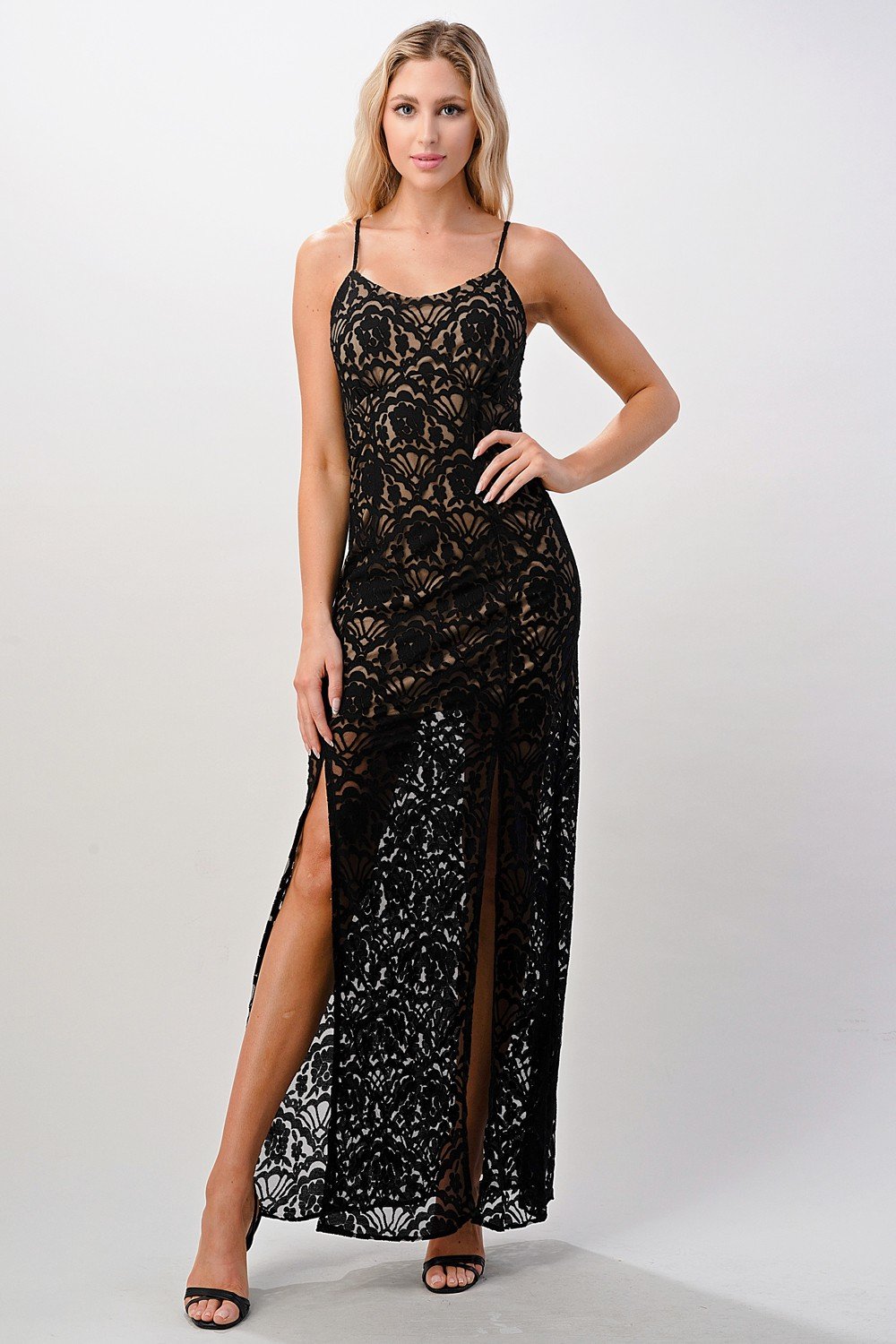 Elegant black lace maxi dress featuring a side slit, perfect for formal occasions.