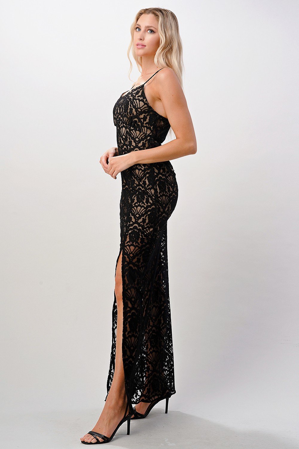 Elegant black lace maxi dress featuring a side slit, perfect for formal occasions.