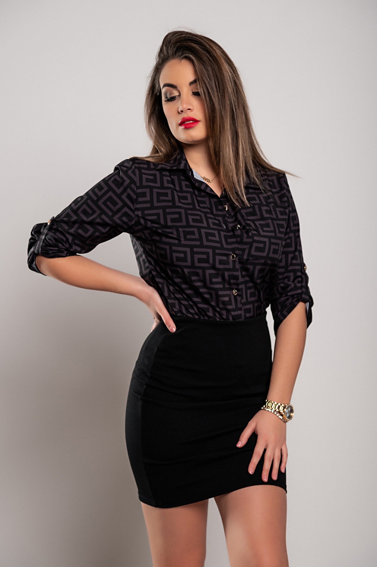 Elegant black blouse by Lavlenta featuring a trendy geometric print, classic collar, and long sleeves.