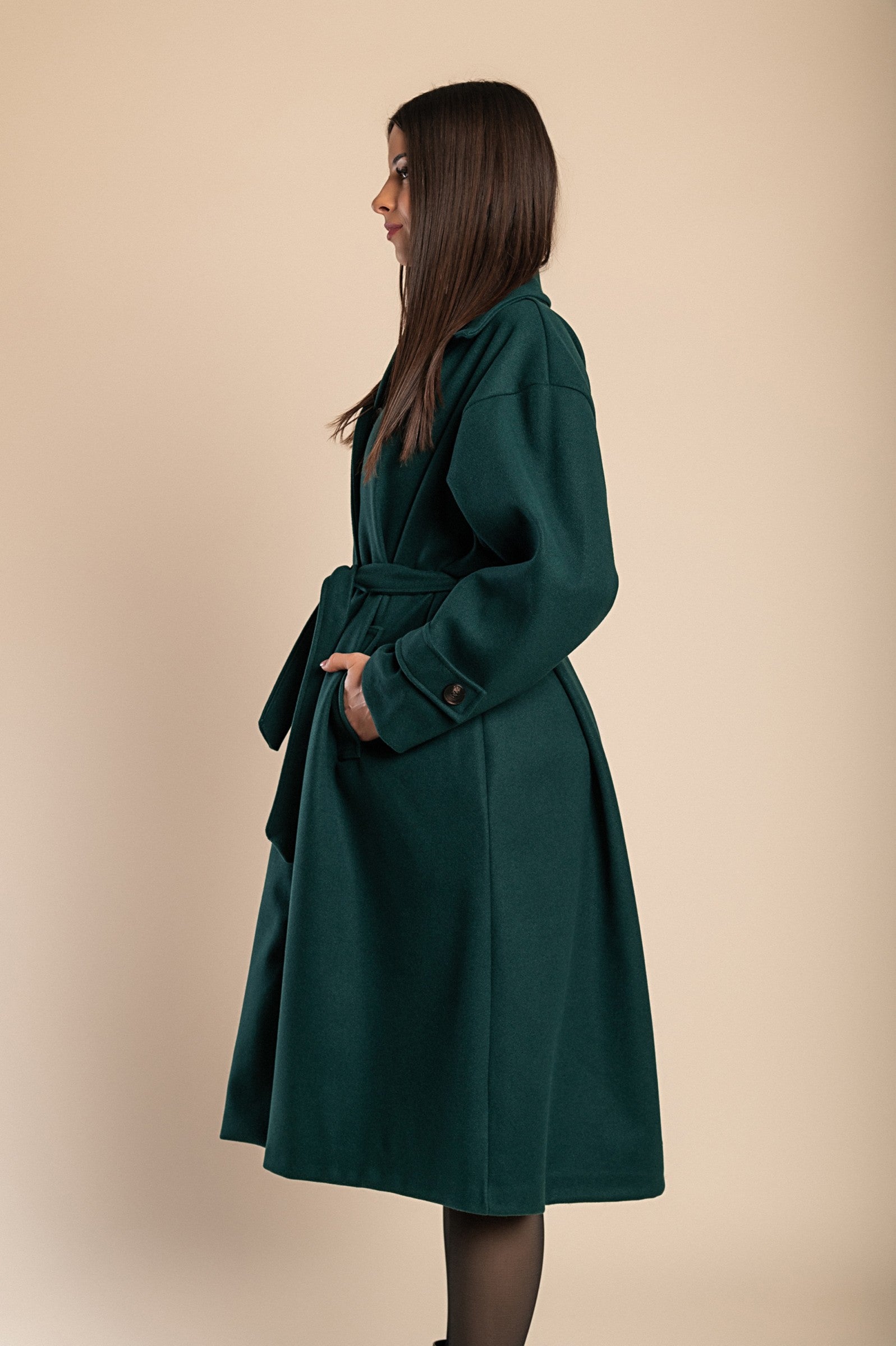 Elegant petrol coat with buttons, featuring a classic collar and decorative belt, made in Italy.