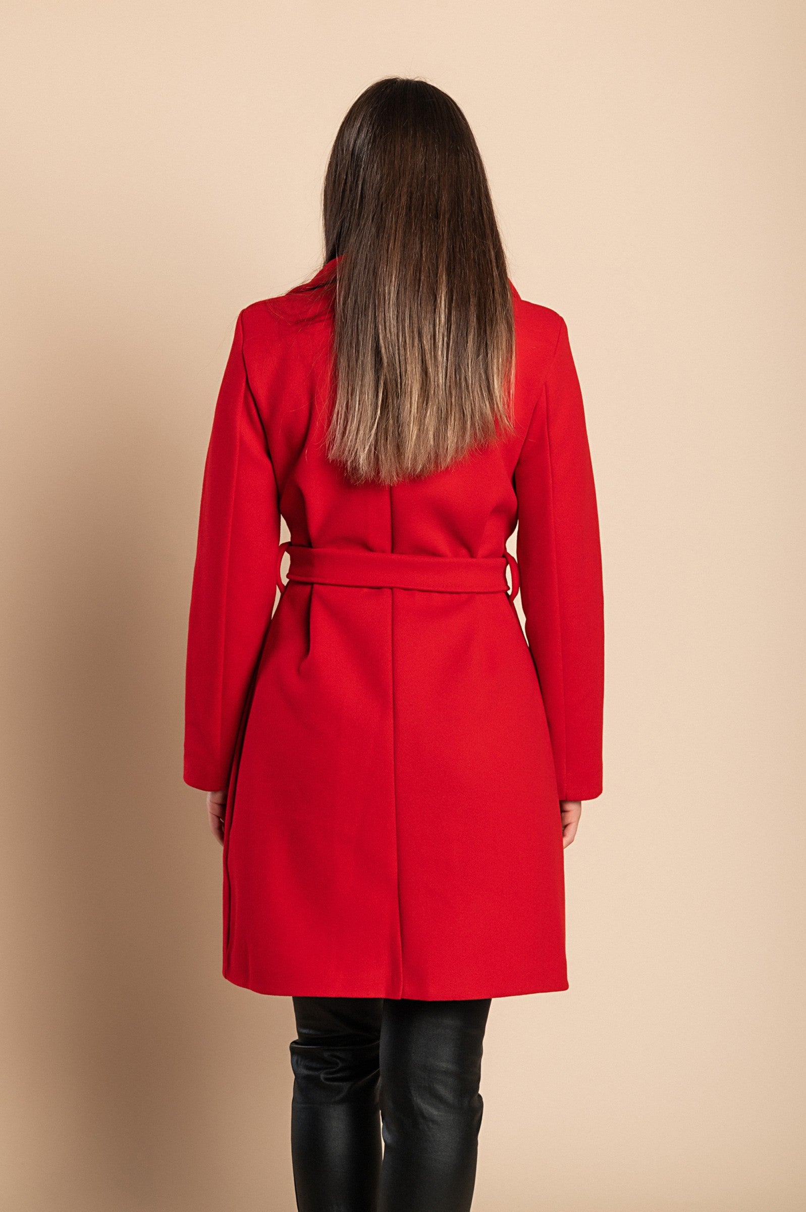Elegant red coat with buttons, featuring a high collar, decorative belt, and side pockets, made from soft, high-quality fabric.