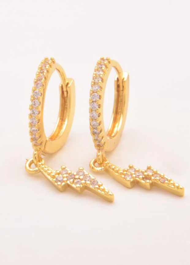 Elegant gold earrings adorned with sparkling rhinestones, showcasing a sophisticated design.