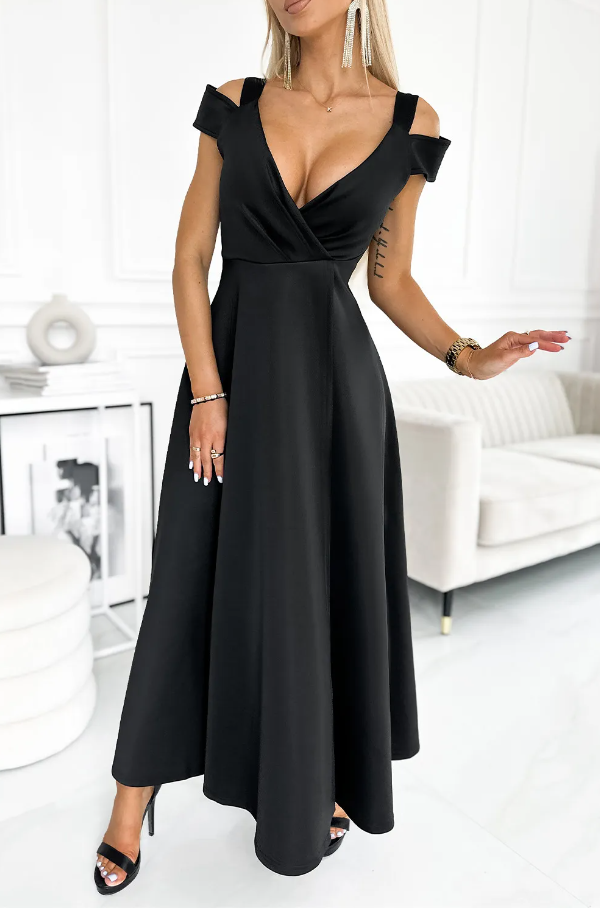 Elegant long black dress featuring shoulder openings and a deep neckline, perfect for formal occasions.