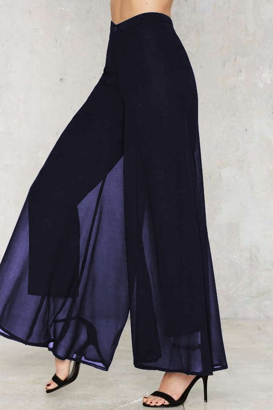 Elegant long pants Veronna in dark blue, featuring a high waist and sheer fabric top layer, designed for comfort and style.
