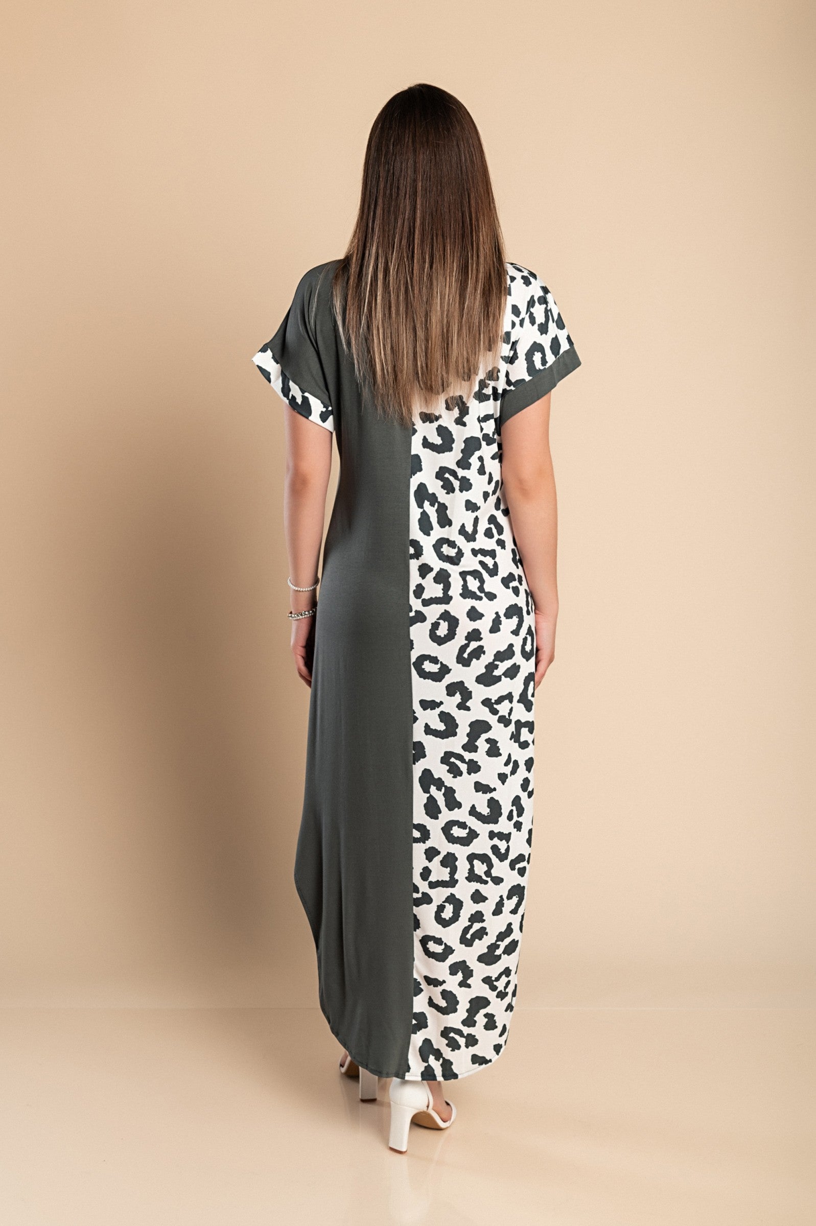 Elegant gray maxi dress featuring leopard print, loose fit, round neckline, and side slits, perfect for stylish comfort.