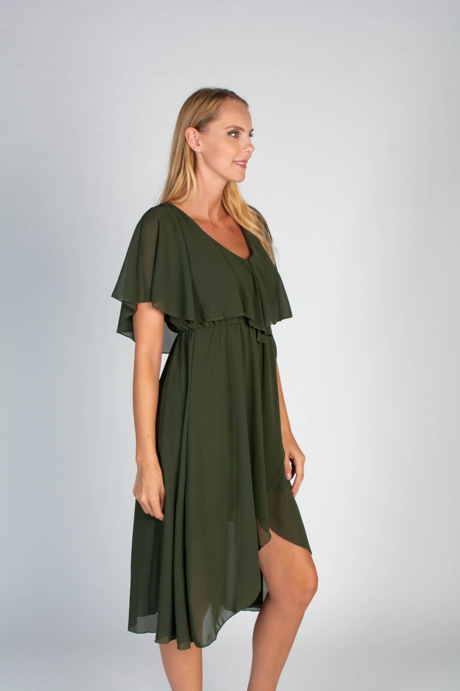 Elegant olive midi dress featuring a deep V-neckline, ruffle detail, and an asymmetric wrap skirt, designed for comfort and style.