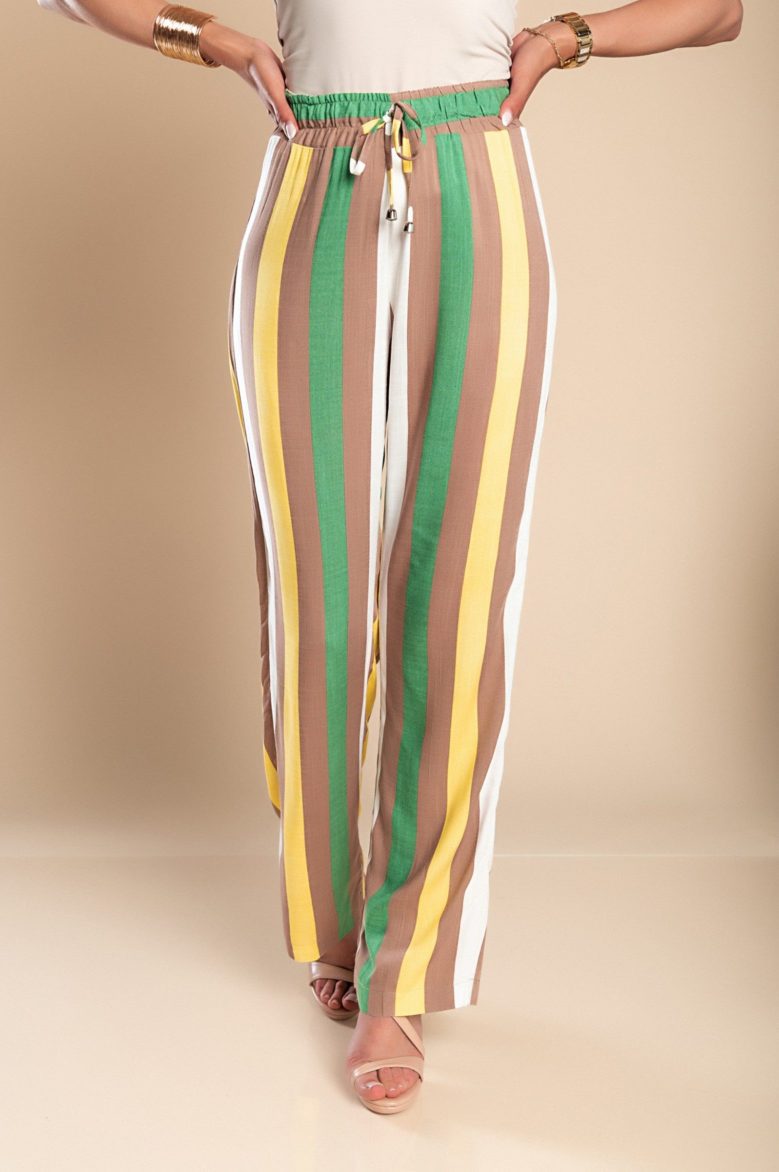 Elegant yellow striped pants made of 100% viscose with an elasticated waist and straight leg design.