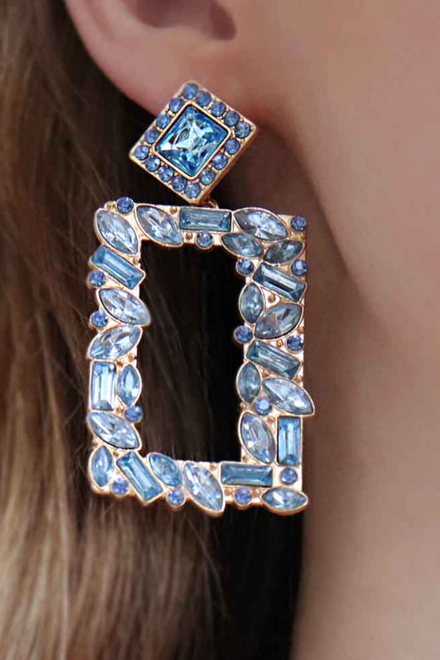 Elegant blue rectangular chandelier earrings adorned with rhinestones, showcasing a modern design.