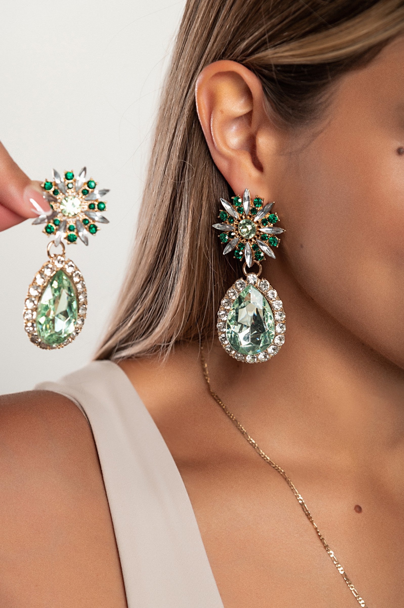 Elegant green rhinestone chandelier earrings with a classic circle shape, designed for stylish women.