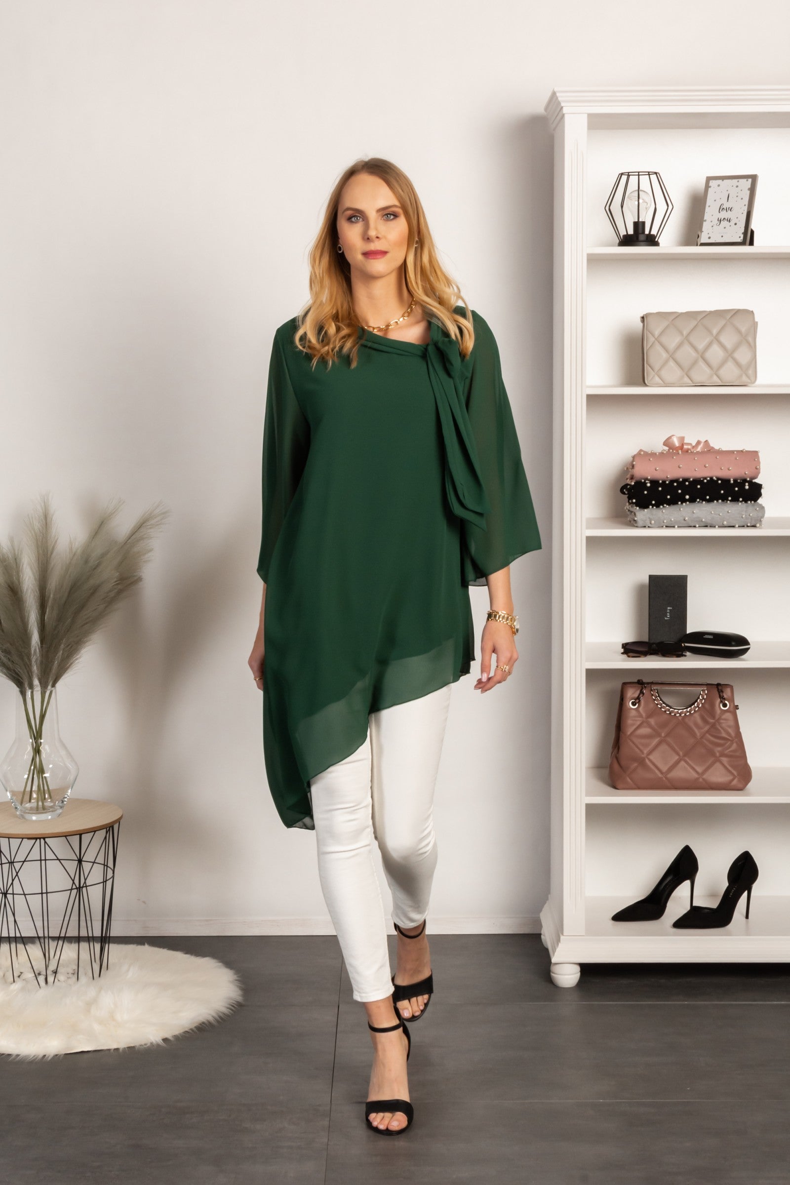 Elegant dark green semi-transparent tunic Ginette with loose 3/4 sleeves and a bow tie neckline, perfect for stylish outfits.