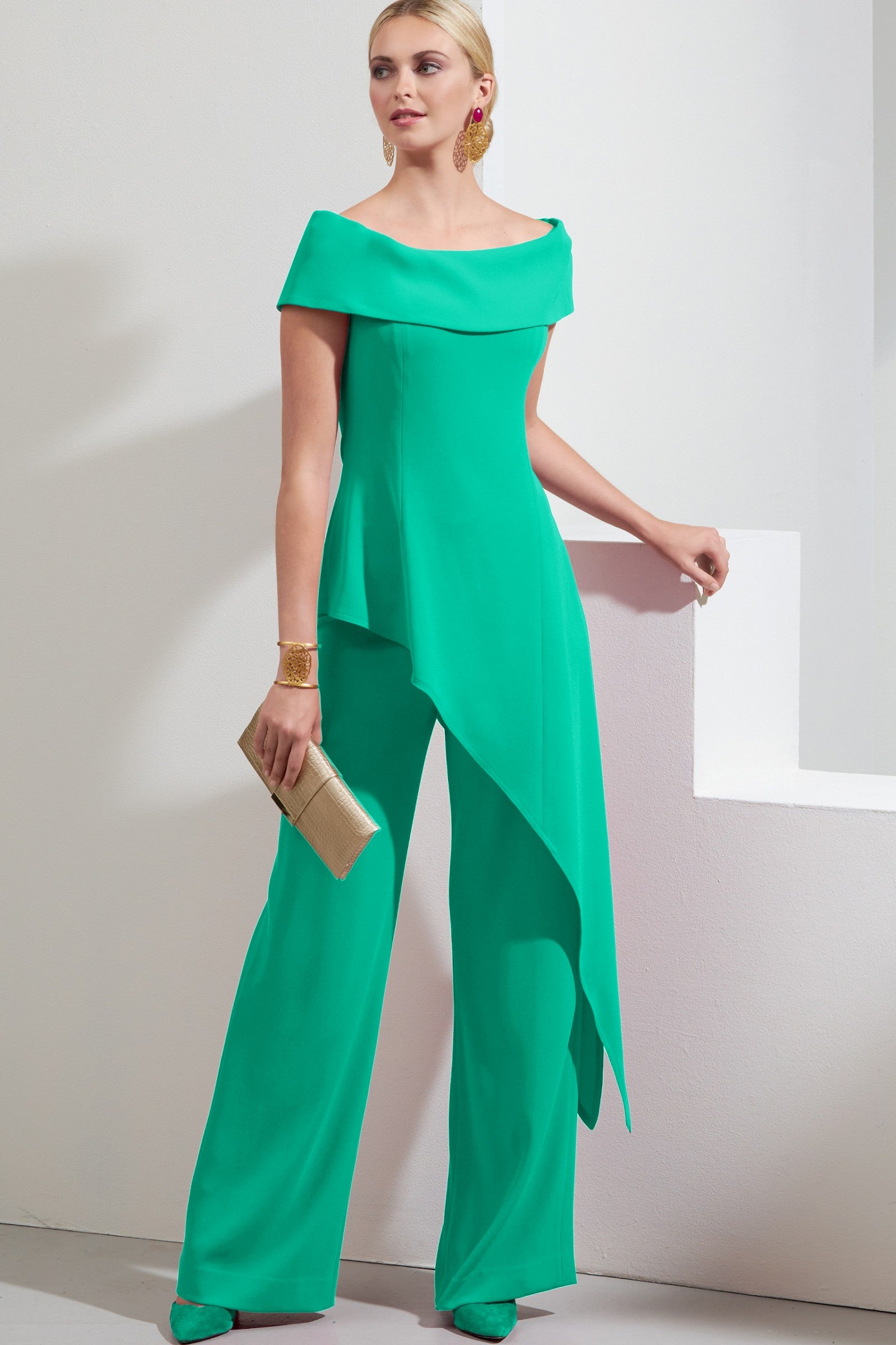 Elegant mint asymmetrical top with short sleeves and loose trousers, showcasing high-quality fabric and stylish design.