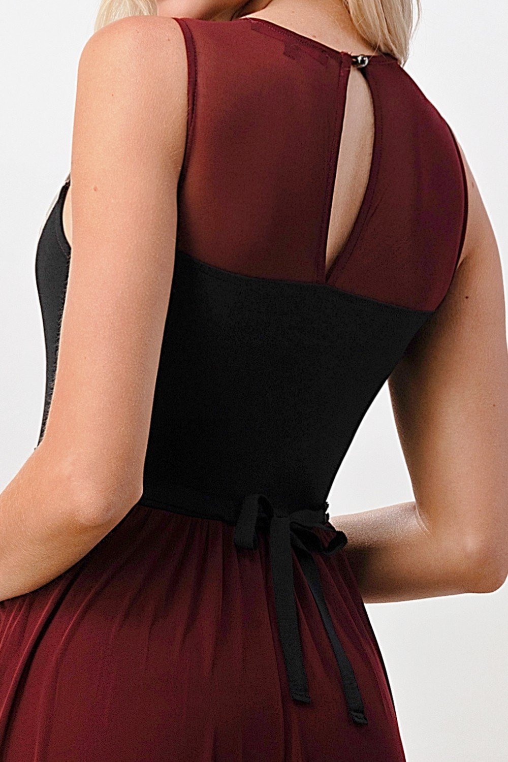 Elegant sheer maxi dress featuring a lace bodice and flowing skirt, perfect for special occasions.