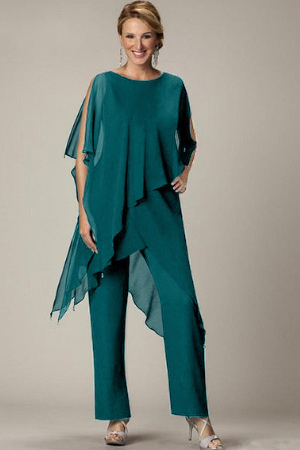 Elegant sheer tunic and long pant set in petrol color, featuring a loose fit and round neckline, made from high-quality fabric.