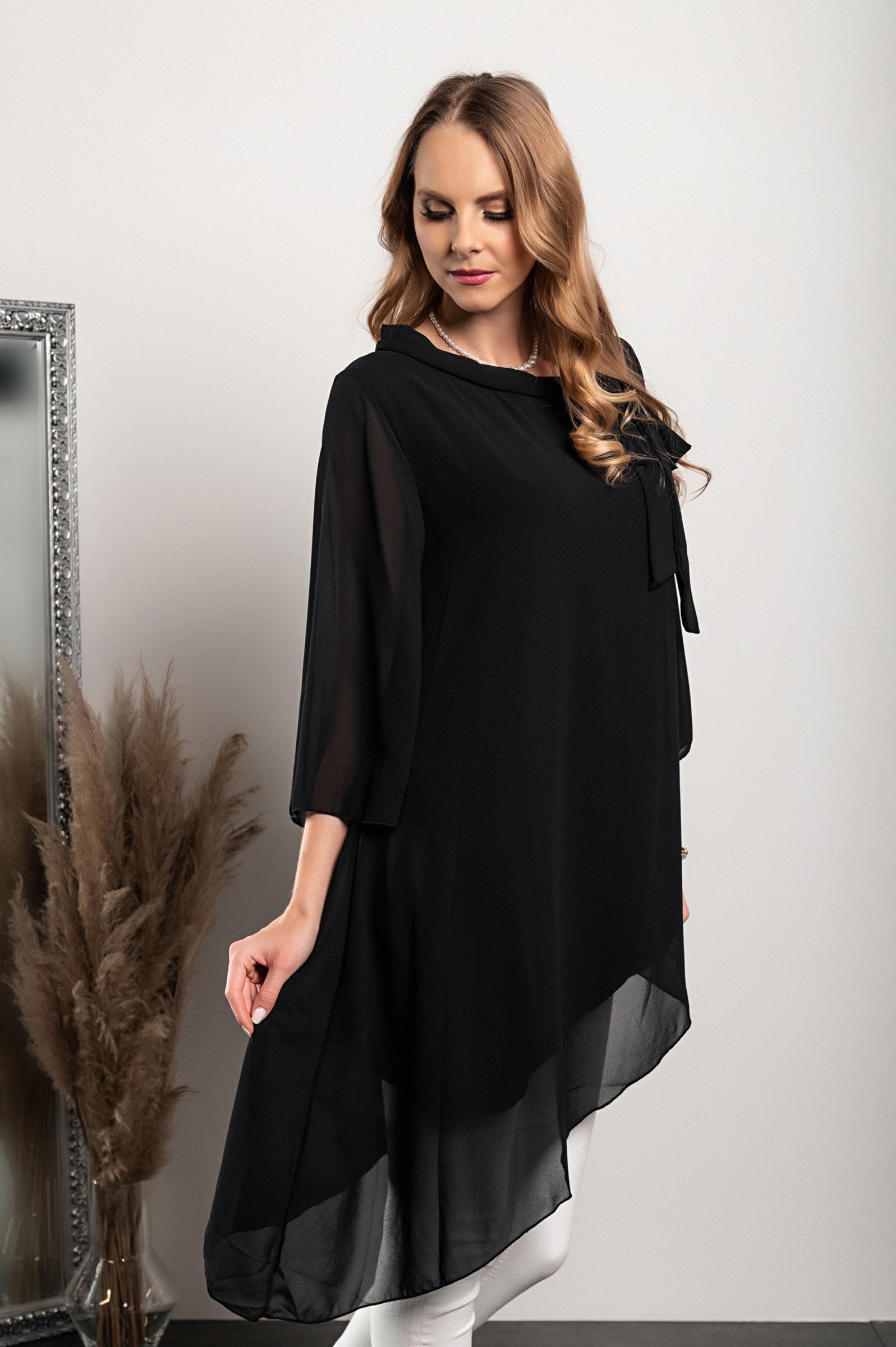 Elegant black translucent tunic Ginette with loose sleeves and bow tie collar, showcasing high-quality Italian craftsmanship.