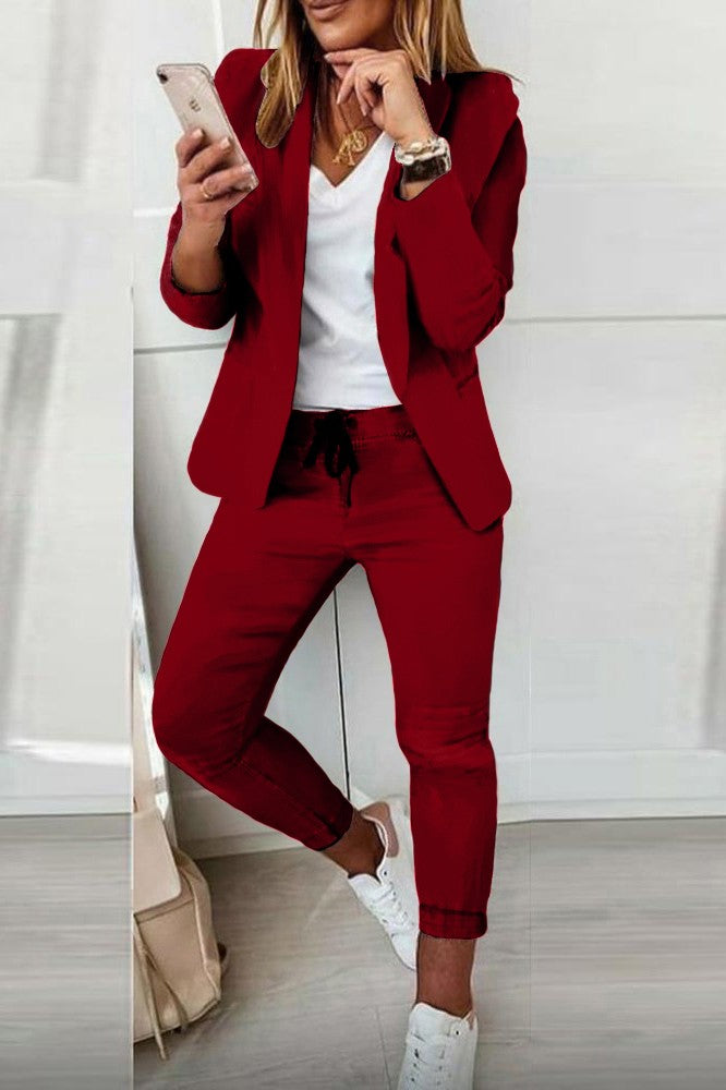 Elegant burgundy trousers and blazer set Estrena, featuring a classic collar and slim fit design, made in Italy.