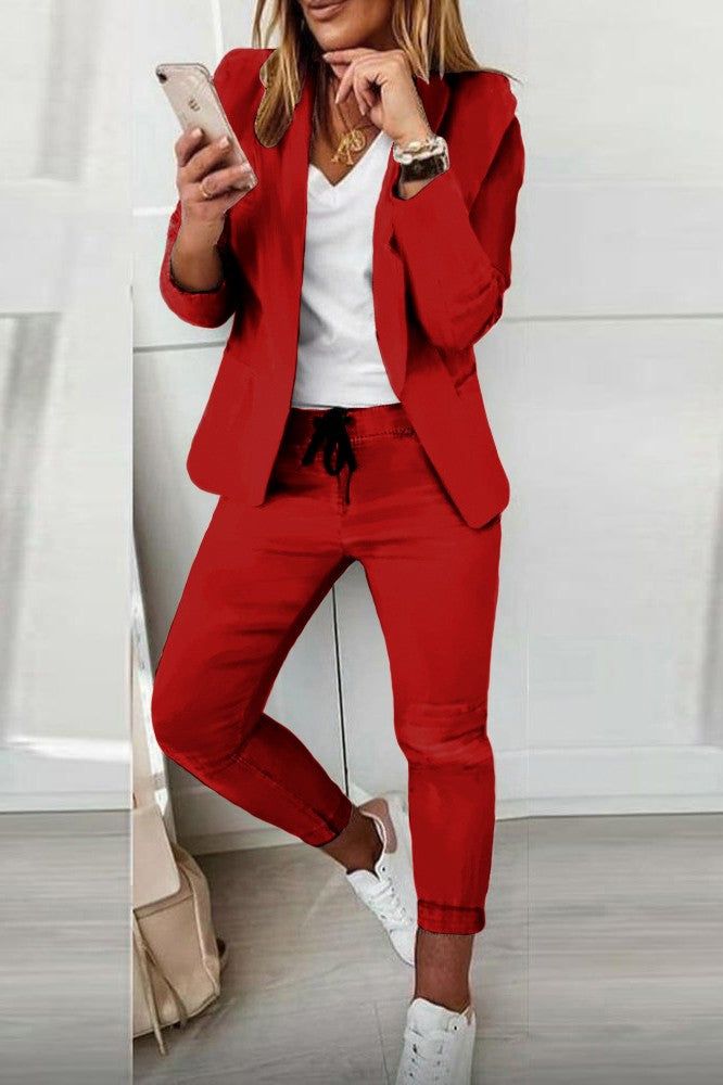 Elegant red trousers and blazer set Estrena, featuring a classic collar and slim fit design, made in Italy.