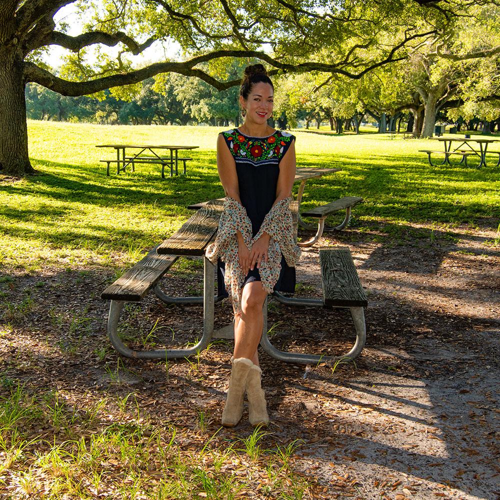 Elvira Hand Embroidered Mexican Loose Dress featuring multicolor floral embroidery on a navy blue cotton fabric, showcasing its unique craftsmanship.