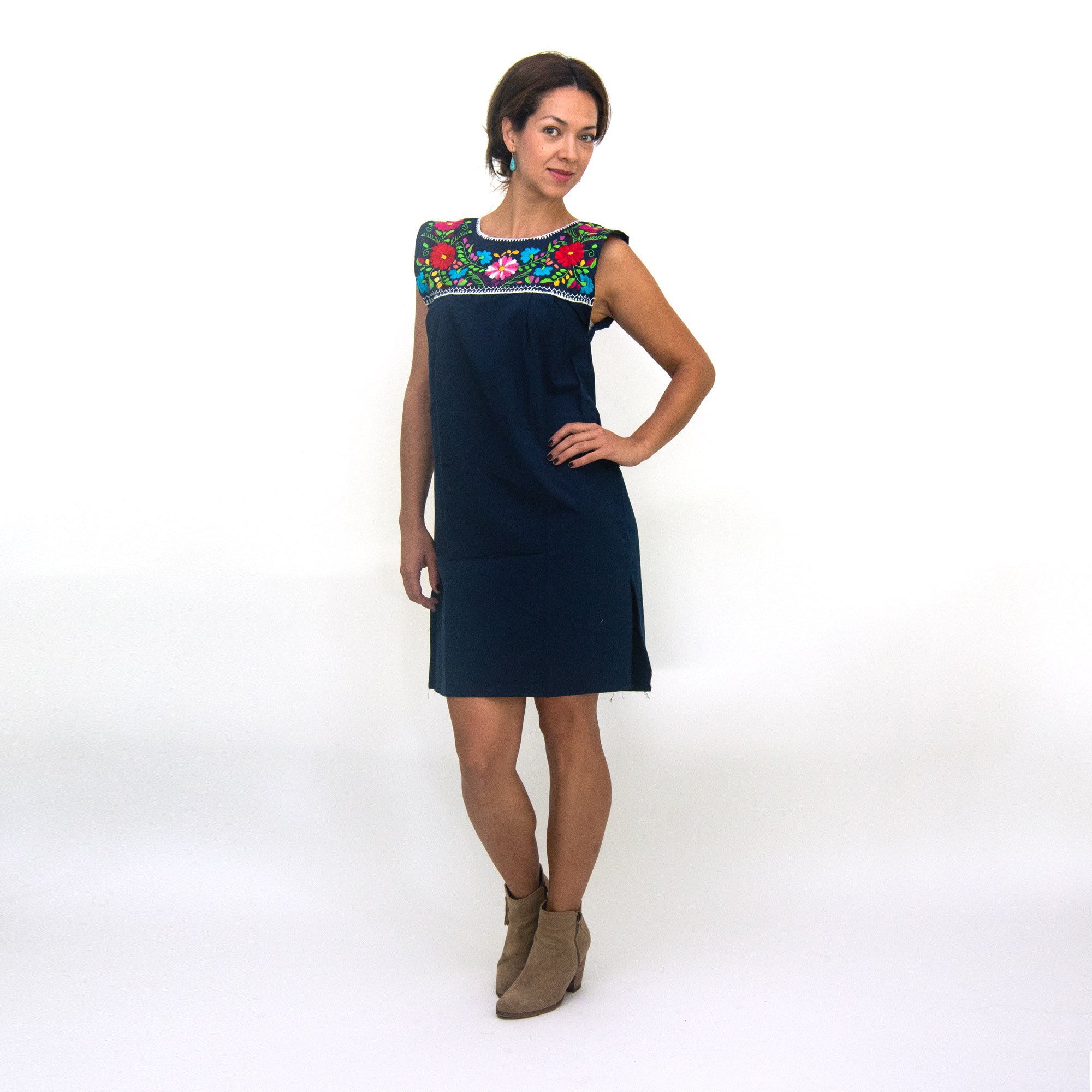 Elvira Hand Embroidered Mexican Loose Dress featuring multicolor floral embroidery on a navy blue cotton fabric, showcasing its unique craftsmanship.