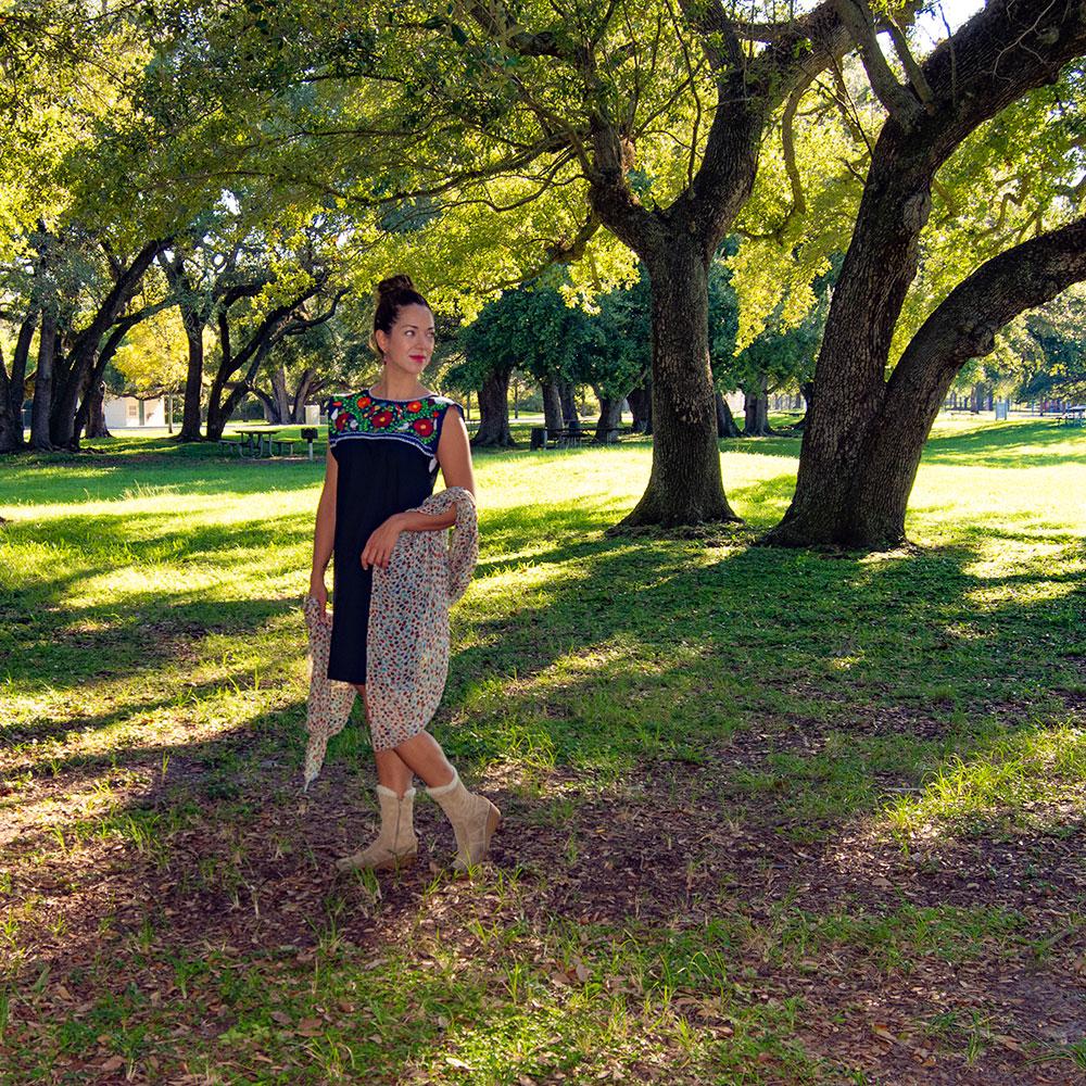 Elvira Hand Embroidered Mexican Loose Dress featuring multicolor floral embroidery on a navy blue cotton fabric, showcasing its unique craftsmanship.