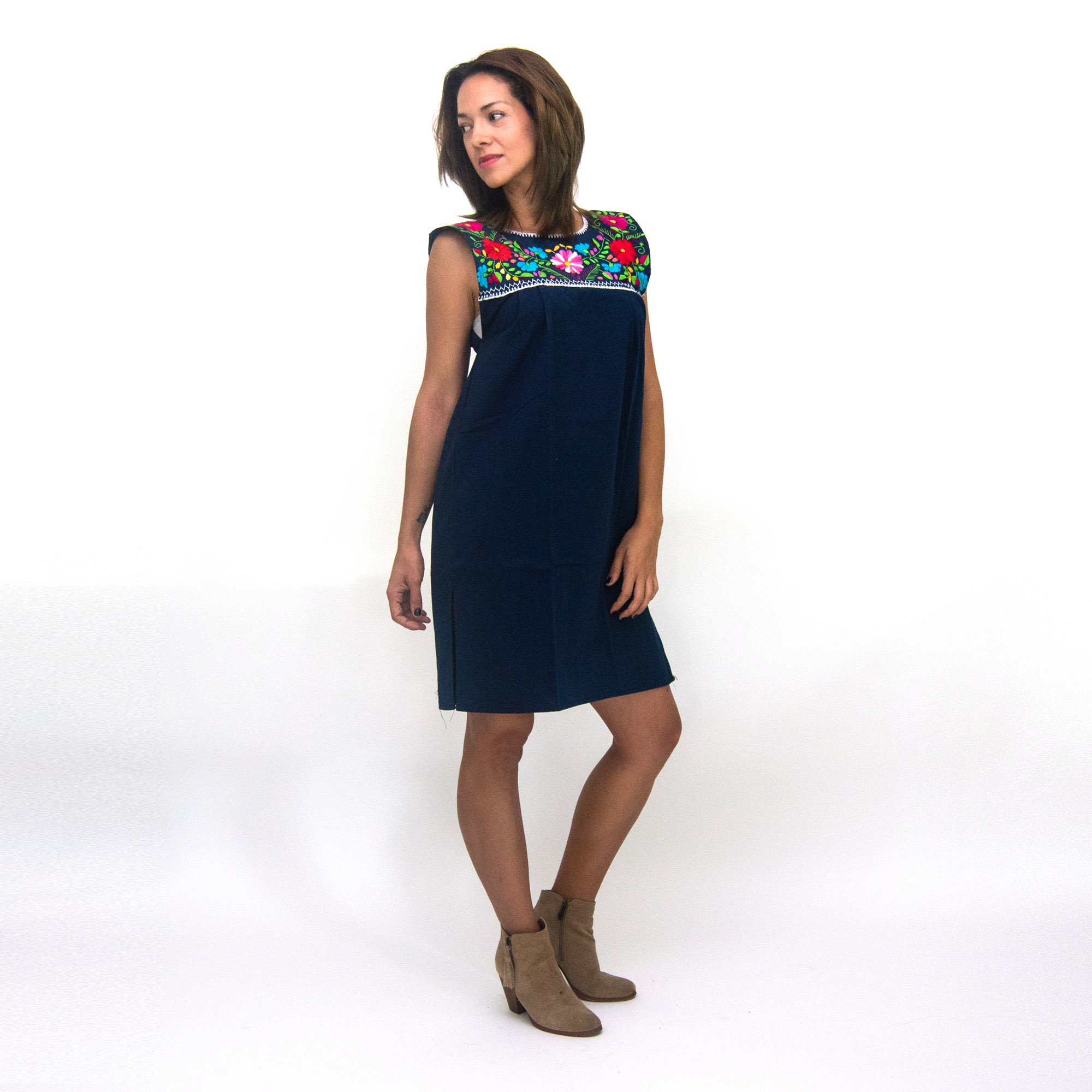 Elvira Hand Embroidered Mexican Loose Dress featuring multicolor floral embroidery on a navy blue cotton fabric, showcasing its unique craftsmanship.