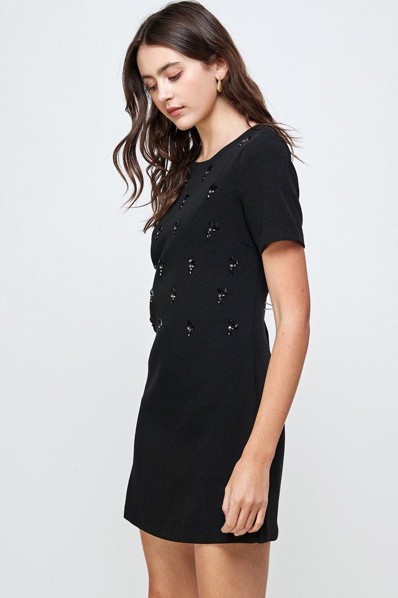 Embellished Short Sleeve Mini Dress with hand-beaded front detail, showcasing a stylish and elegant design.