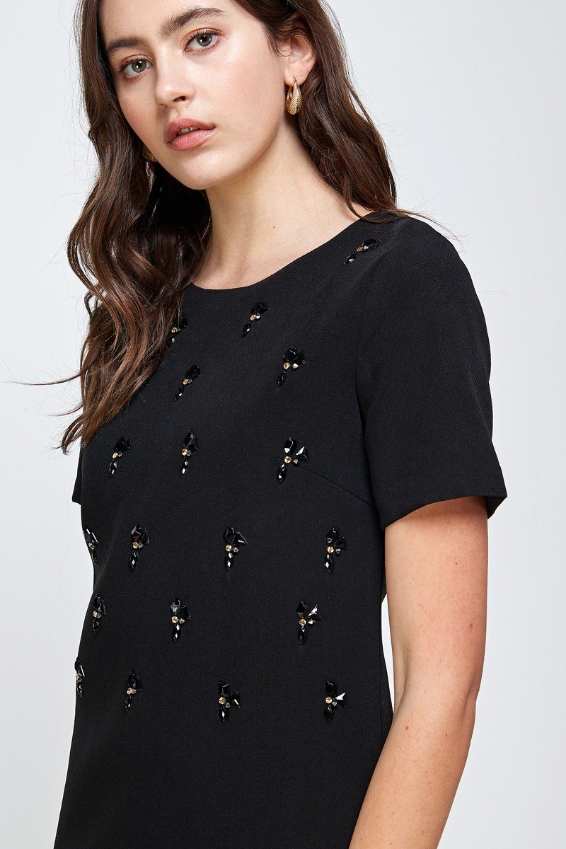 Embellished Short Sleeve Mini Dress with hand-beaded front detail, showcasing a stylish and elegant design.