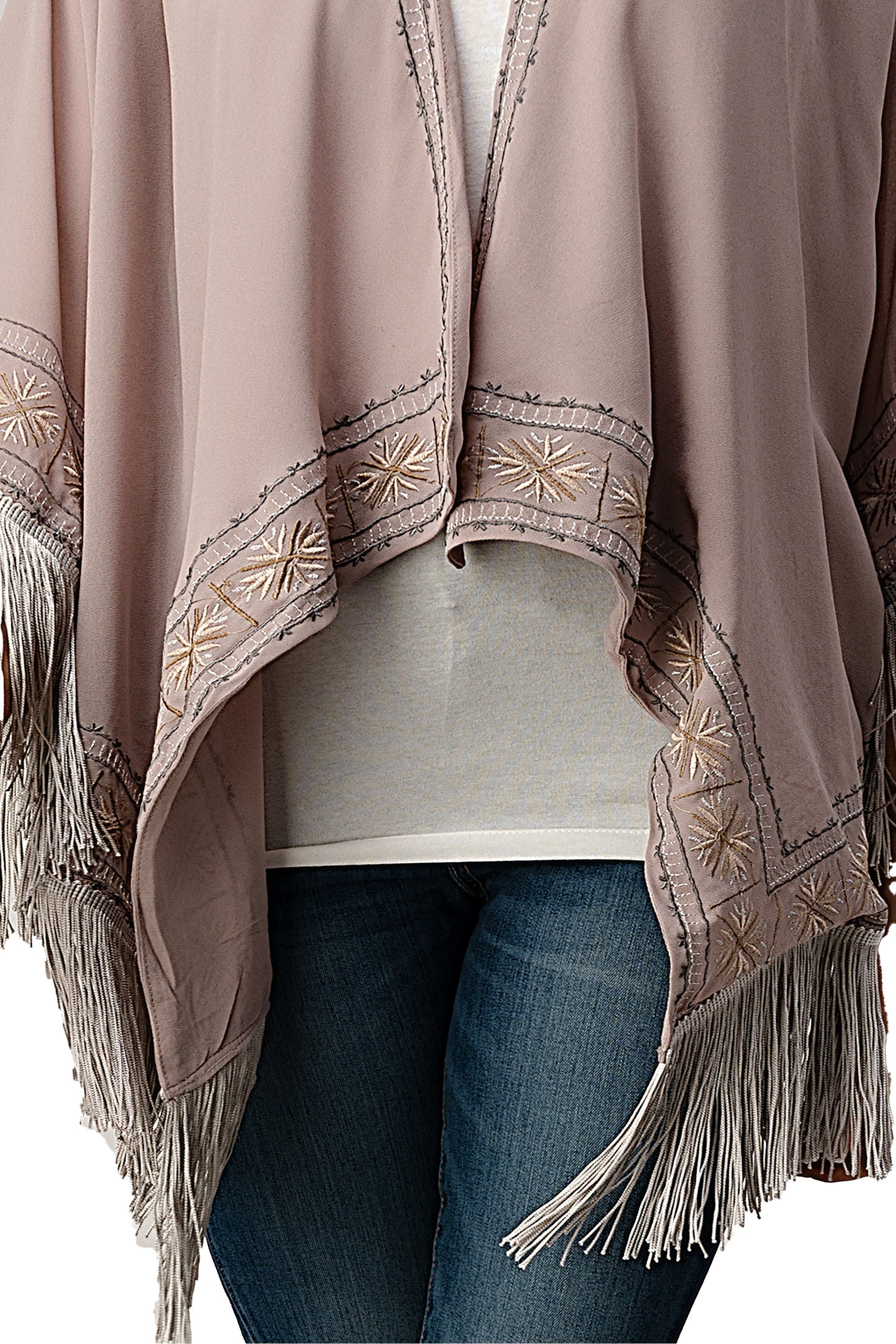 Embroidered Fringe Kimono in georgette fabric with tassel hem, showcasing intricate patterns and a bohemian style.