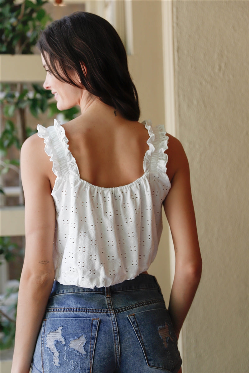Embroidered Ruffle Trim Strap Sleeveless Crop Top in white with ruffle trim and adjustable drawstring hem, showcasing a stylish summer look.