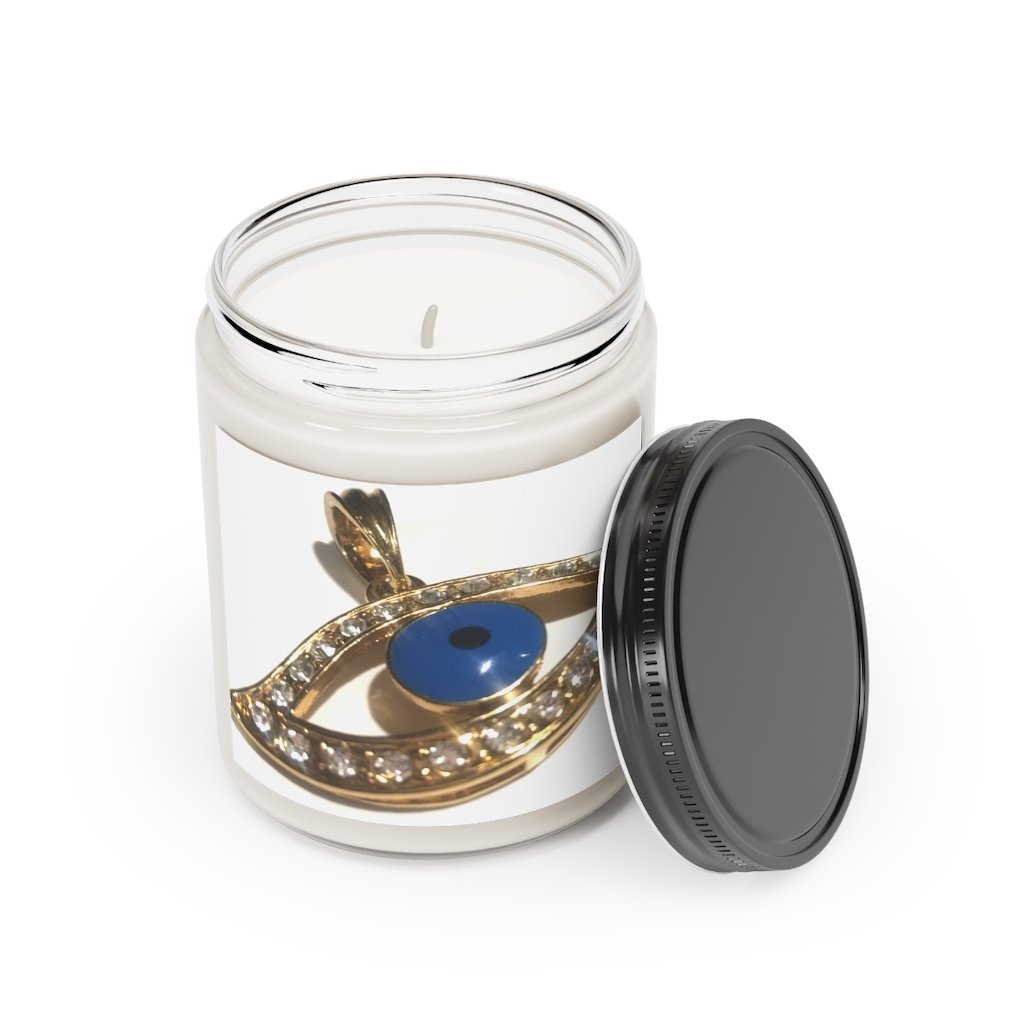 Eye Of Horus Scented Candle in a glass container, featuring a warm Cinnamon Stick and Vanilla fragrance, hand-poured from vegan soy coconut wax.