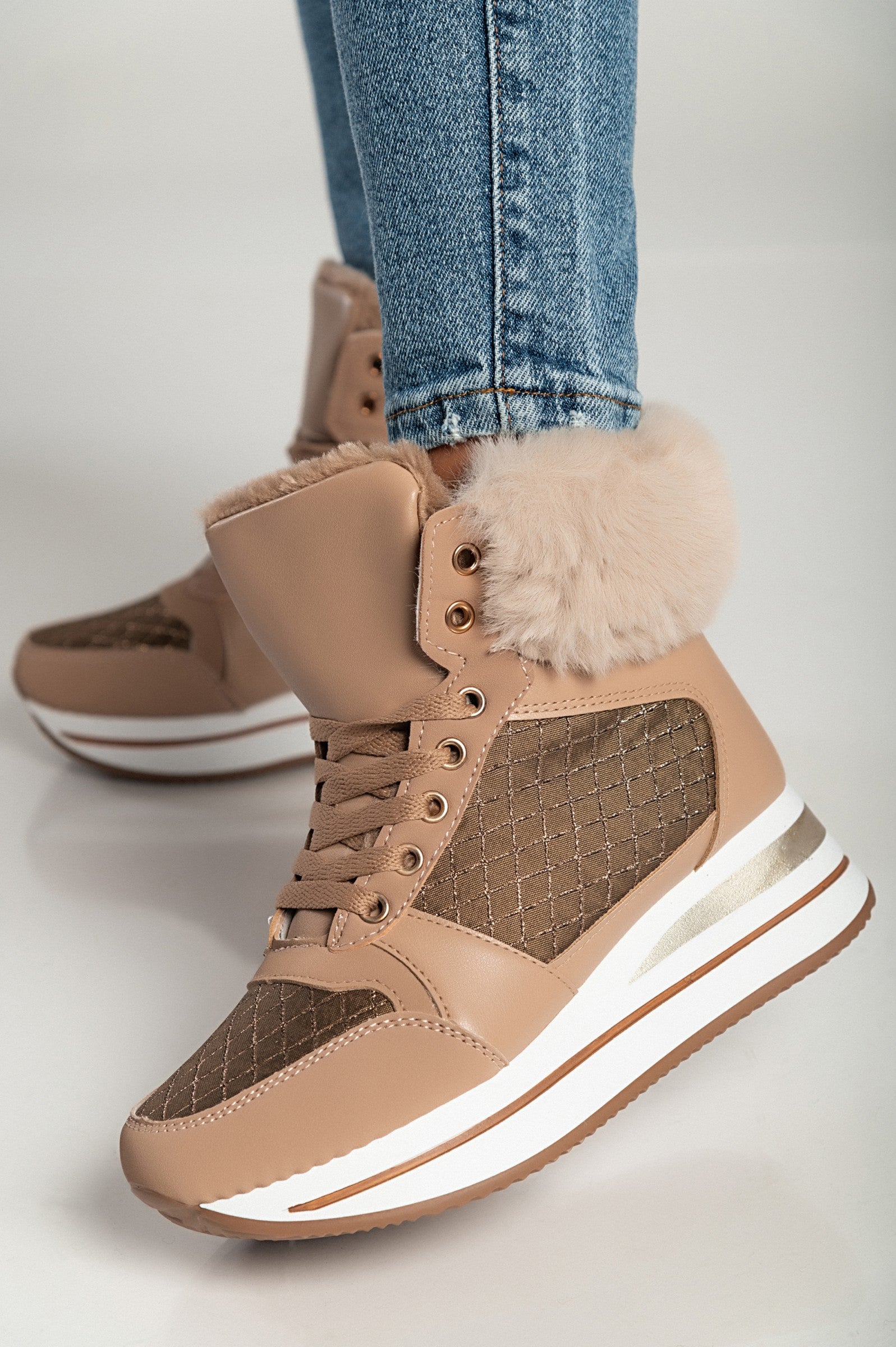 Camel fashion sneakers made of faux leather and textile, featuring a raised sole, round toe, and synthetic fur around the ankle.