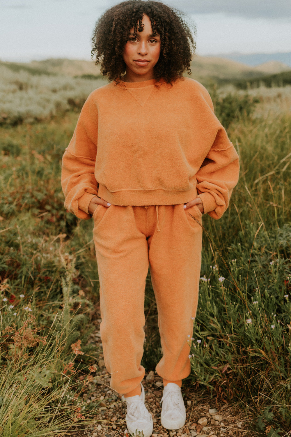 Finding Peace Joggers made from ultra-soft heavy fleece, showcasing their stylish design and organic cotton fabric.