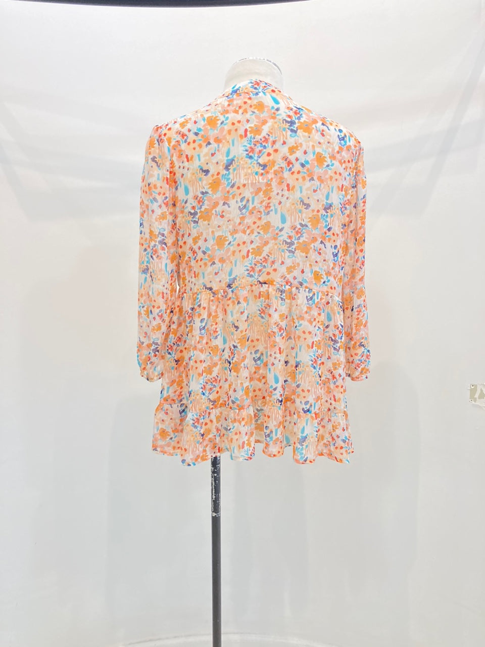 Floral Print Long Sleeve Babydoll Blouse featuring a V-neck and lightweight chiffon fabric, perfect for casual outings.