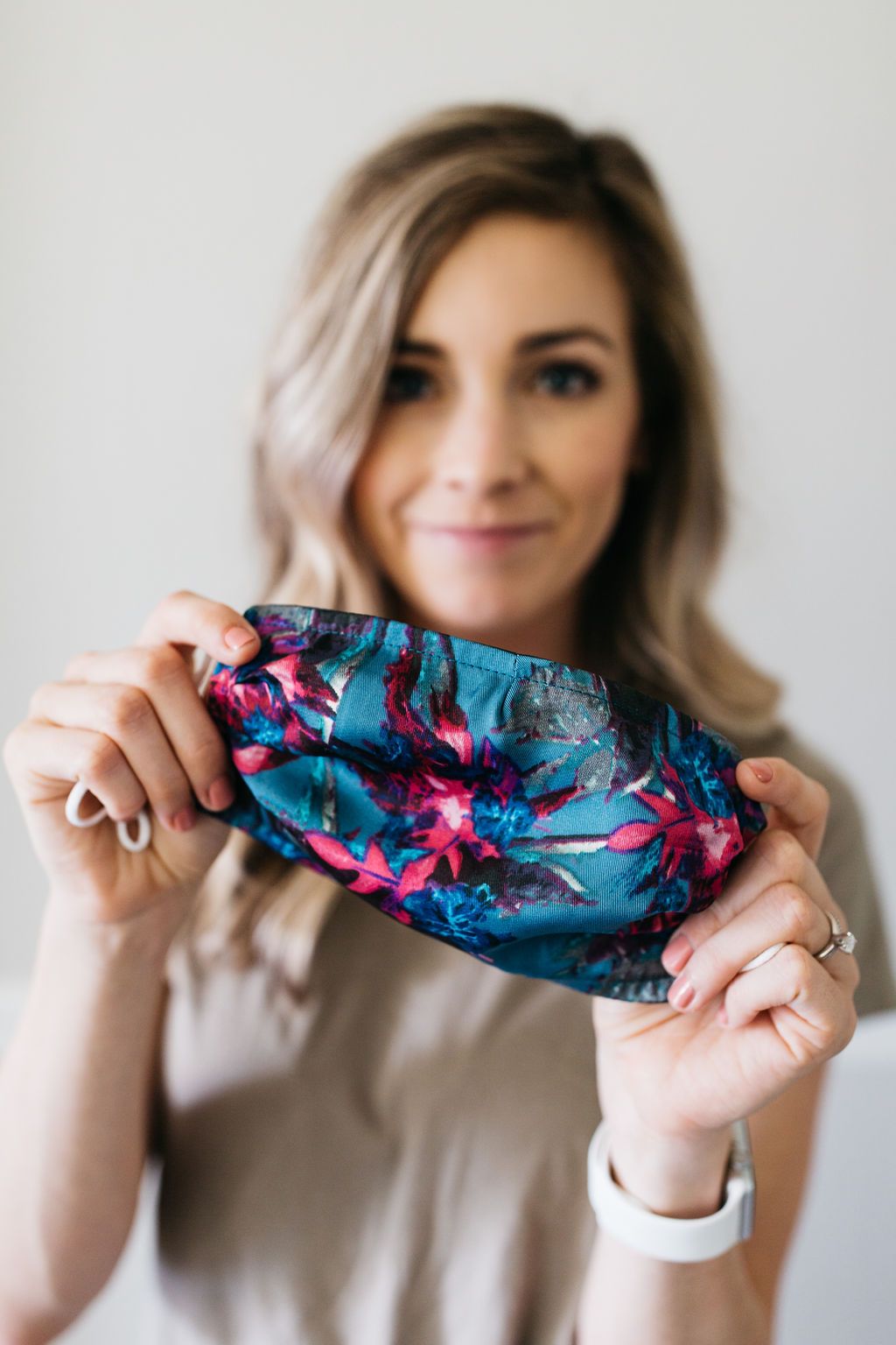 Floral Satin Face Mask featuring a vibrant floral pattern, made of soft satin polyester with adjustable nylon ear loops.