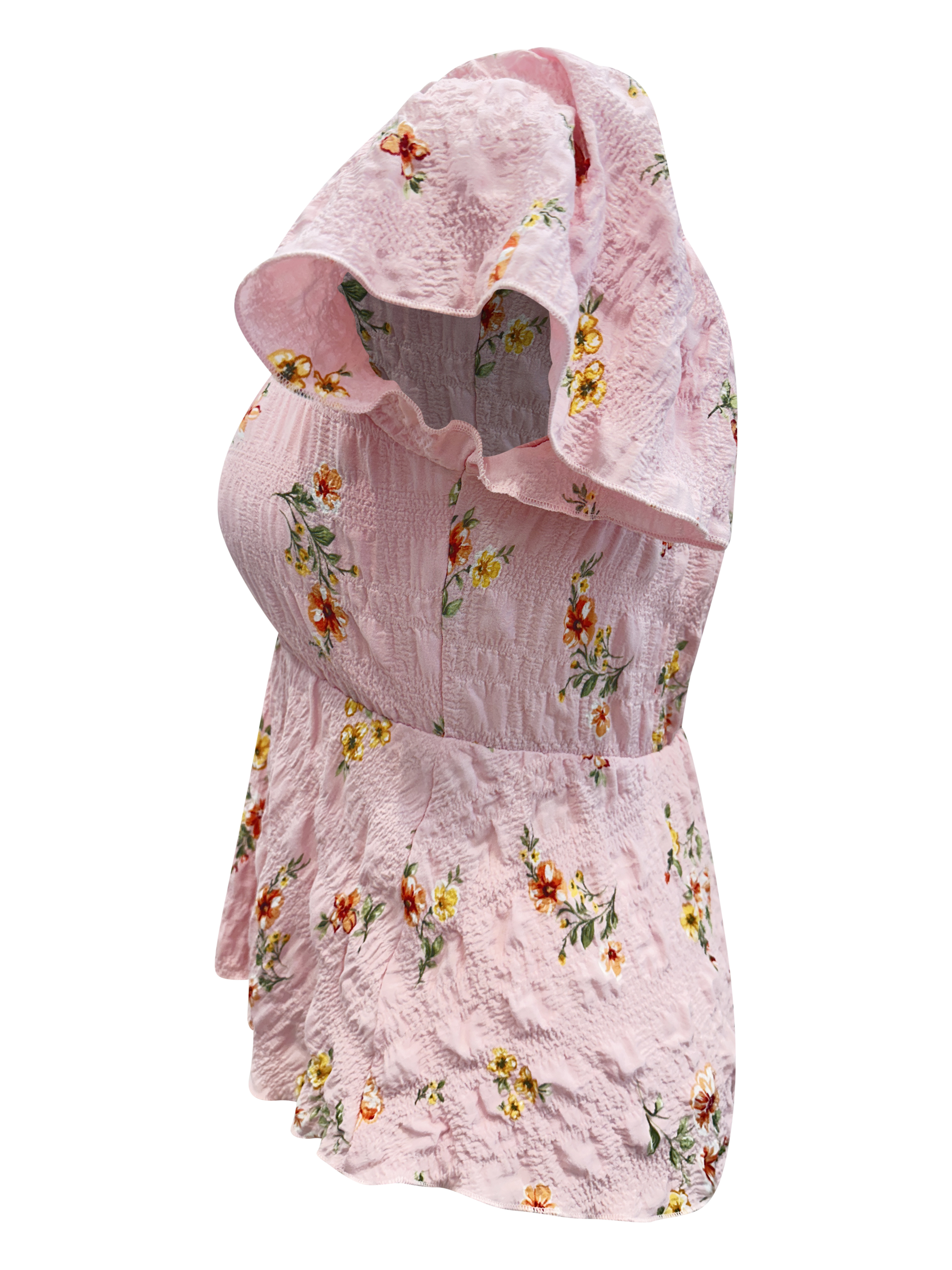 Floral Smocked Peplum Blouse featuring V-neck, cap sleeves, and flounce hem in bubble gauze fabric.