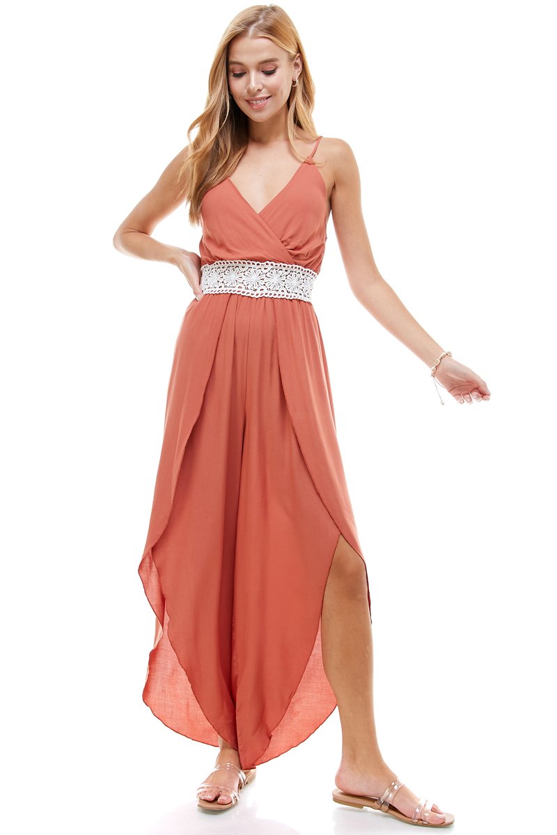 Floral and solid crochet tulip leg cami jumpsuit displayed on a model, showcasing its stylish design and flattering fit.