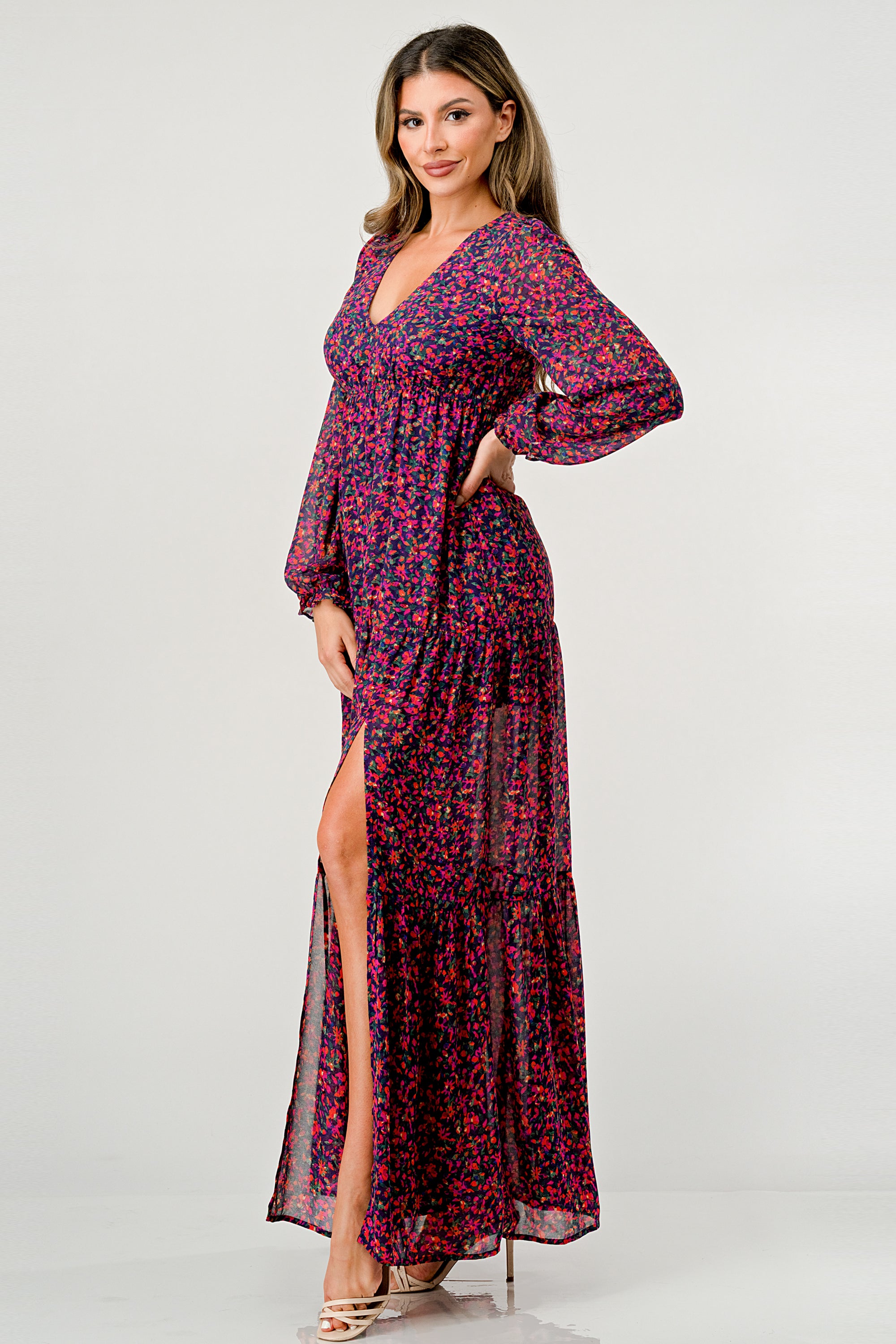 Floral V-Neck Long Sleeve Maxi Dress featuring a tiered skirt and side slit, elegantly displayed on a mannequin.