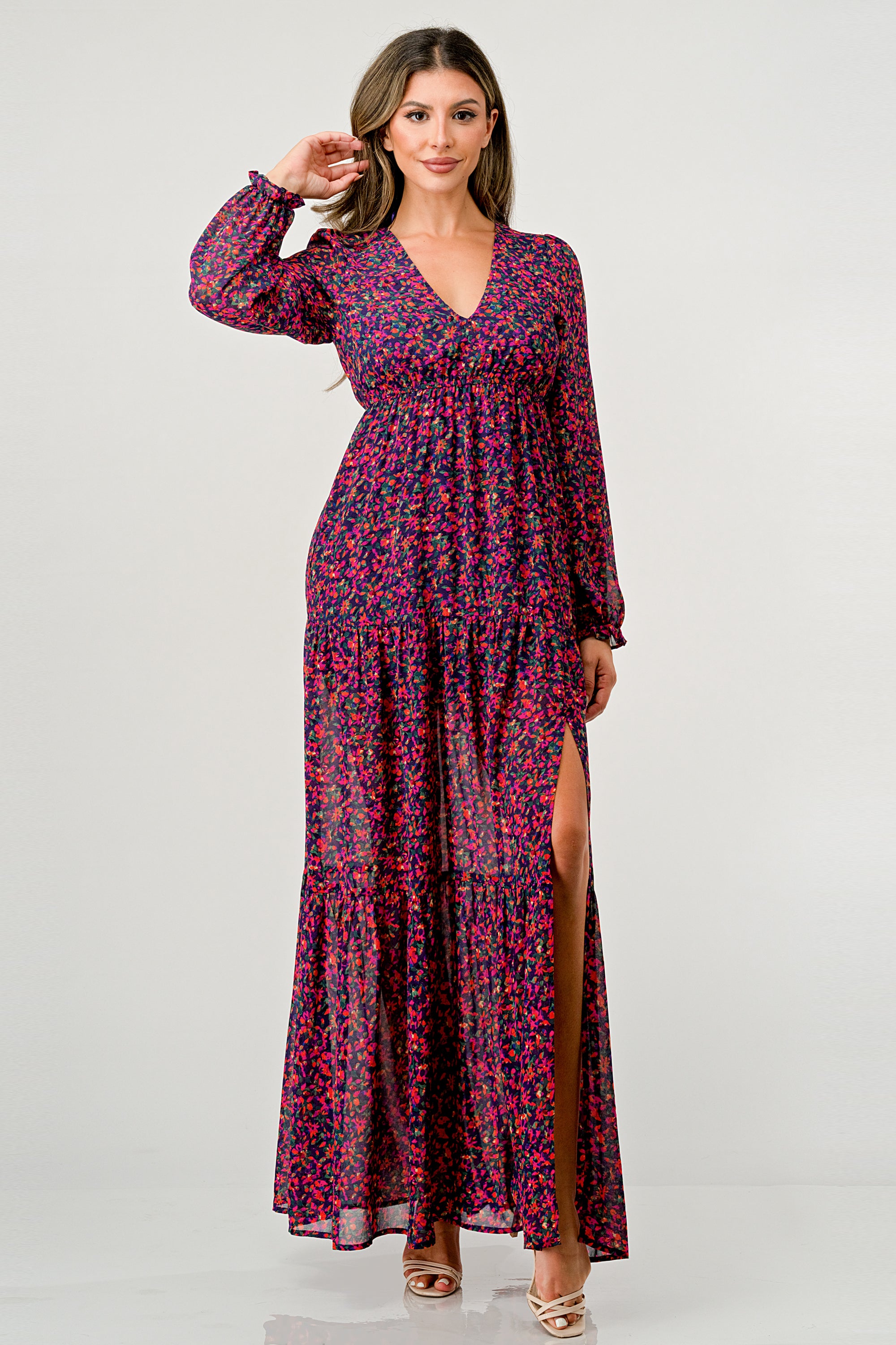 Floral V-Neck Long Sleeve Maxi Dress featuring a tiered skirt and side slit, elegantly displayed on a mannequin.